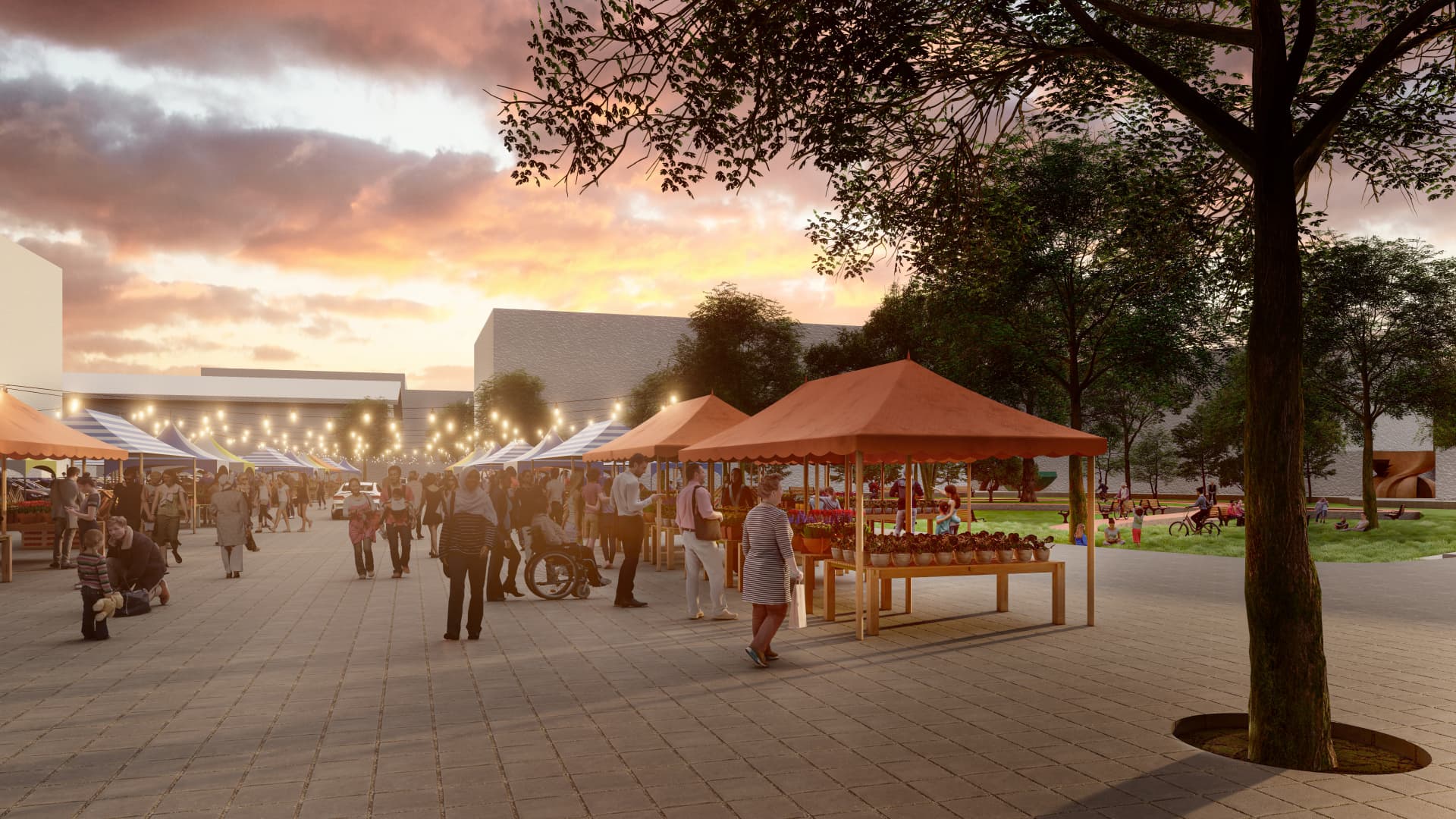 Evening market on a public plaza with stalls, string lights and people